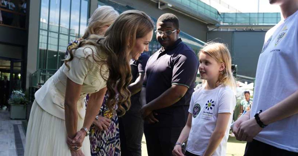 Kate Middleton meets Lydia Lowe, eight, from the Dan Maskell Tennis Trust, as she arrives to attend the Ladies' Singles Final during day thirteen of The Championships Wimbledon 2025. (Cover Image Source: Getty Images | Jordan Pettitt)