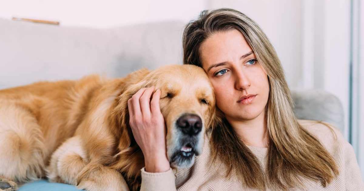 A sad-looking owner with her pet dog. (Representative Cover Image Source: Getty Images | Eugenio Marongiu)