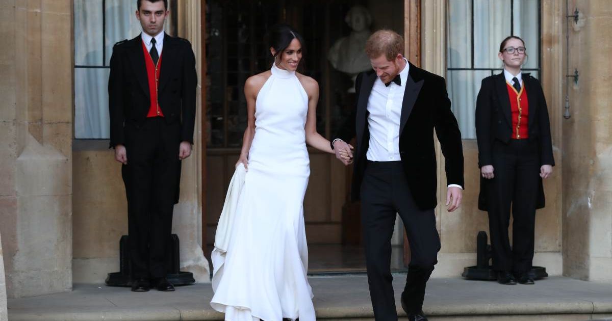 Duchess of Sussex and Prince Harry, Duke of Sussex, leave Windsor Castle after their wedding to attend an evening reception at Frogmore House, hosted by the Prince of Wales. (Cover Image Source: Getty Images | Steve Parsons - WPA Pool)