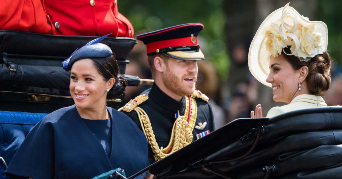 Meghan Markle, Prince Harry, and Kate Middleton ride by carriage down the Mall during Trooping the Color. (Cover Image Source: Getty Images | Samir Hussein/WireImage)