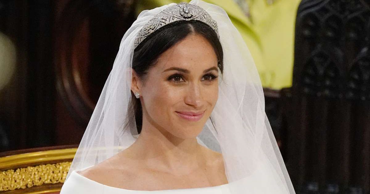 Meghan Markle stands at the altar during her wedding in St. George's Chapel at Windsor Castle. (Cover Image Source: Getty Images | Jonathan Brady - WPA Pool)