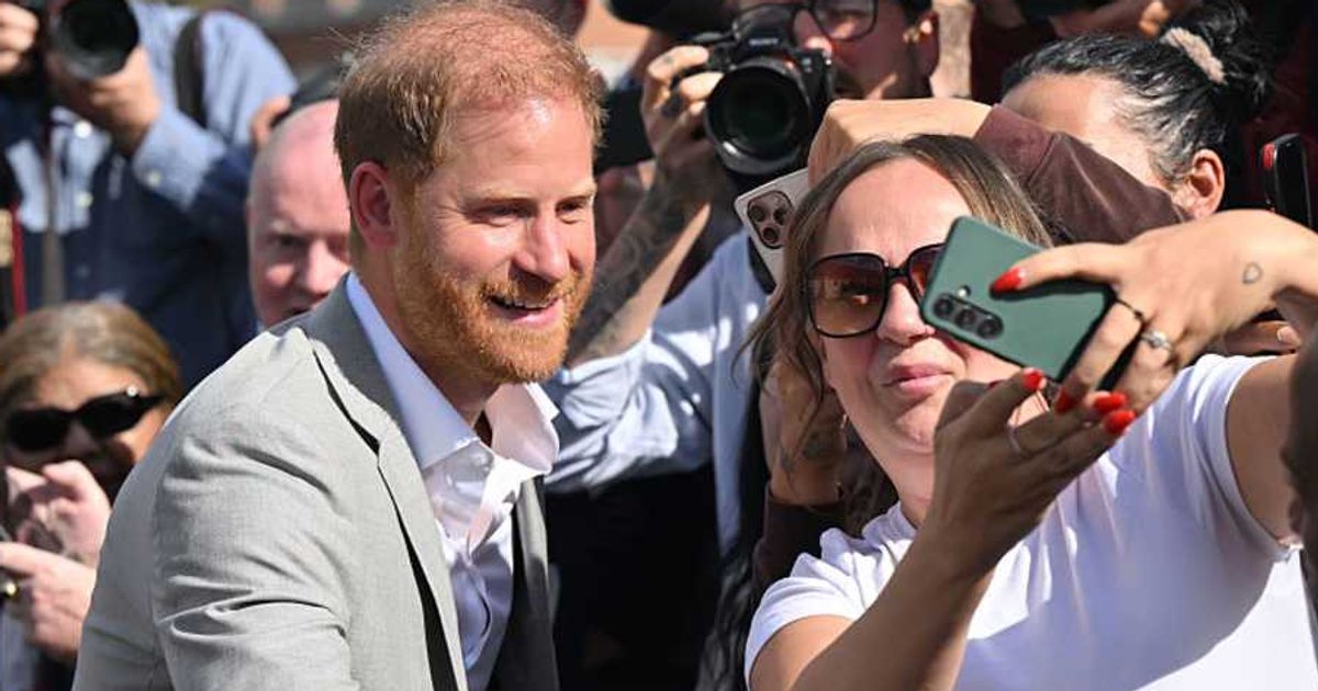 Prince Harry greets fans after visiting the community recording studio in St. Ann's. (Cover Image Source: Getty Images| Paul Grover - WPA Pool)