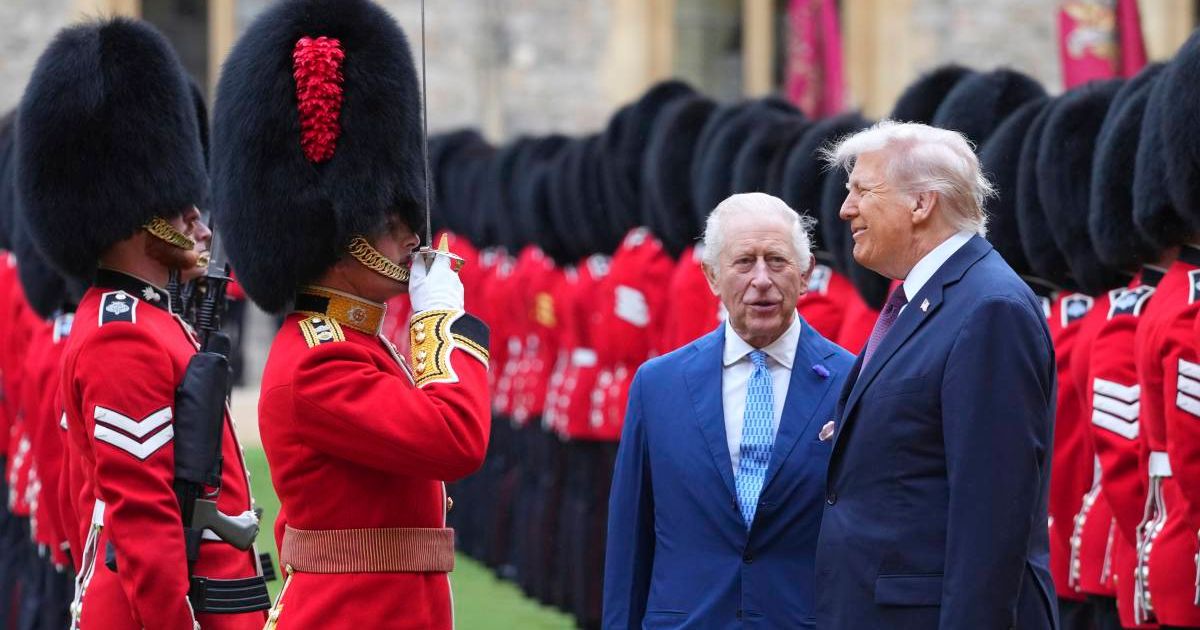 US President Donald Trump and King Charles review the Guard of Honor after arrival at Windsor Castle. (Cover Image Source: Getty Images | Kirsty Wigglesworth)