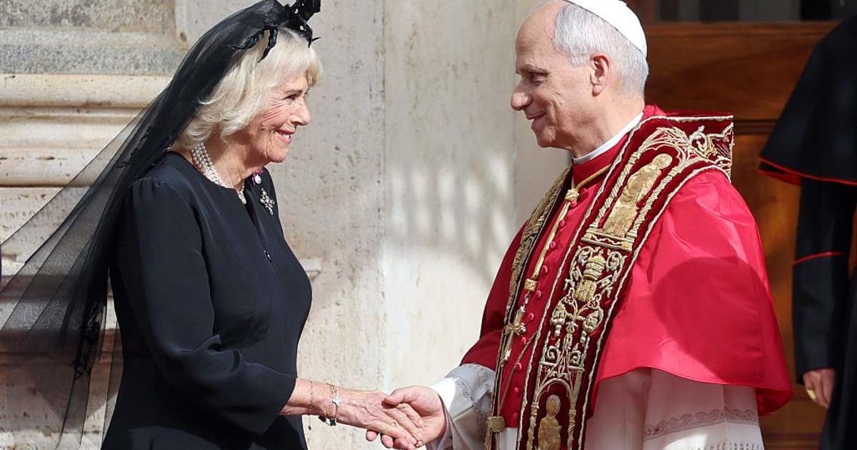 Queen Camilla and Pope Leo shake hands as they depart from the San Damaso Courtyard. (Cover Image Source: Getty Images| Chris Jackson)