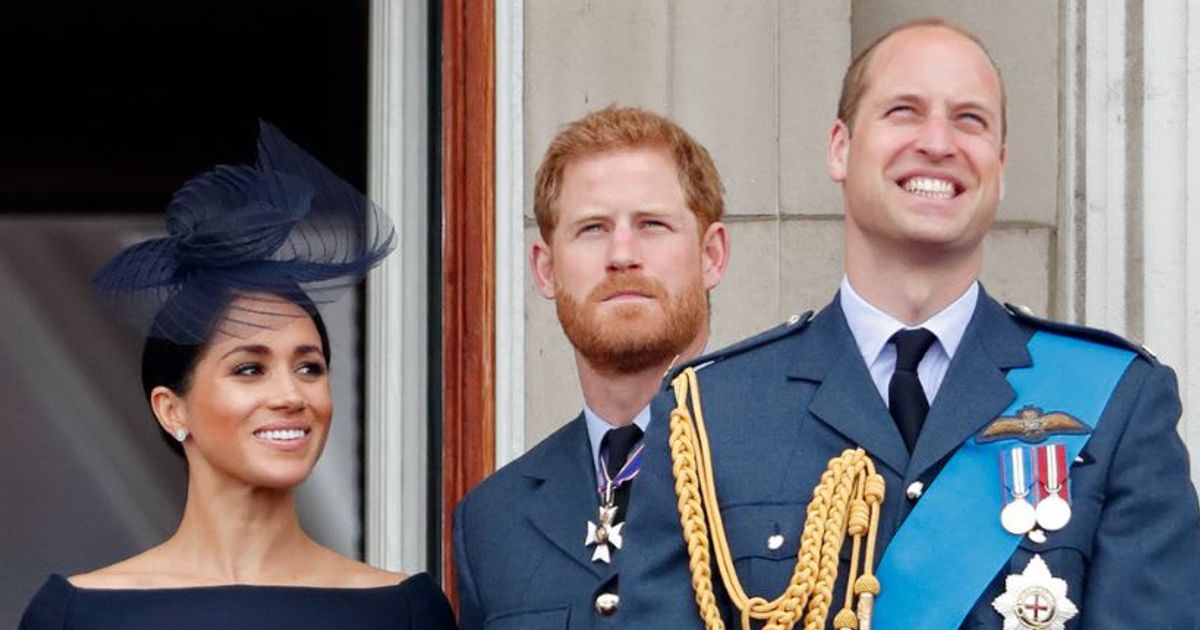 Meghan, Duchess of Sussex, Prince Harry, Duke of Sussex, and Prince William, Prince of Wales, watch a flypast to mark the centenary of the Royal Air Force. (Cover Image Source: Getty Images | Max Mumby/Indigo)