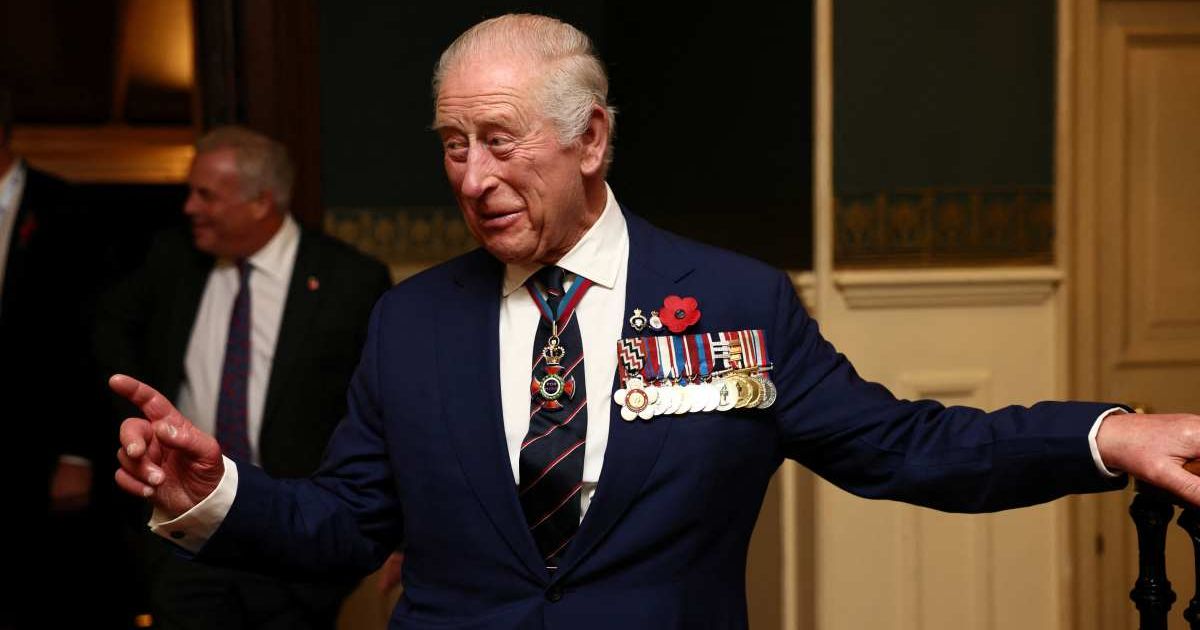 King Charles gestures as he arrives at the Royal Albert Hall for the Royal British Legion Festival of Remembrance. (Cover Image Source: Getty Images | Jack Taylor - WPA Pool)