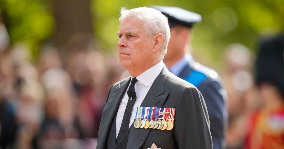 Andrew Mountbatten Windsor walks behind the coffin during the ceremonial procession of the coffin of Queen Elizabeth II from Buckingham Palace to Westminster Hall. (Cover Image Source: Getty Images | Martin Meissner)