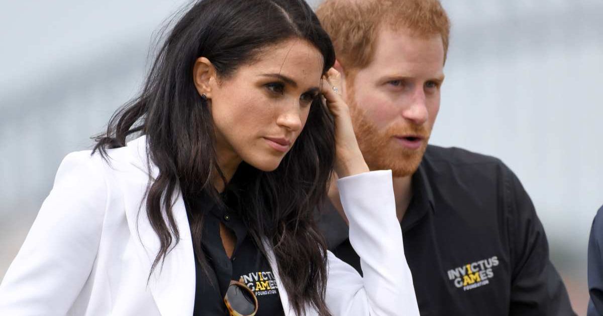 Prince Harry, Duke of Sussex and Meghan, Duchess of Sussex attend the Invictus Games Sydney 2018 Jaguar Land Rover Driving Challenge on Cockatoo Island (Cover Image Source: Getty Images | Karwai Tang/WireImage)