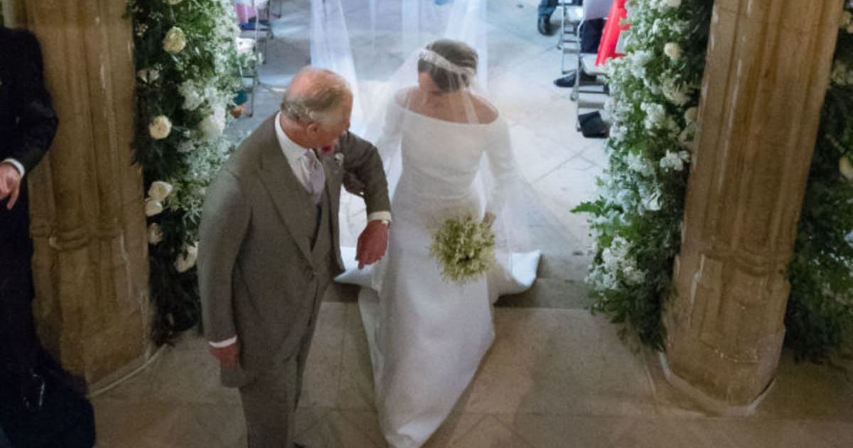Meghan Markle walks up the aisle with King Charles at St George's Chapel at Windsor Castle during her wedding. (Cover Image Source: Getty Images| Dominic Lipinski/ - WPA Pool)