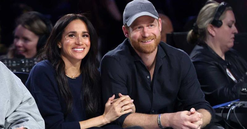 Meghan Markle Gets Mocked for How She Was Holding Onto Prince Harry at Recent Event