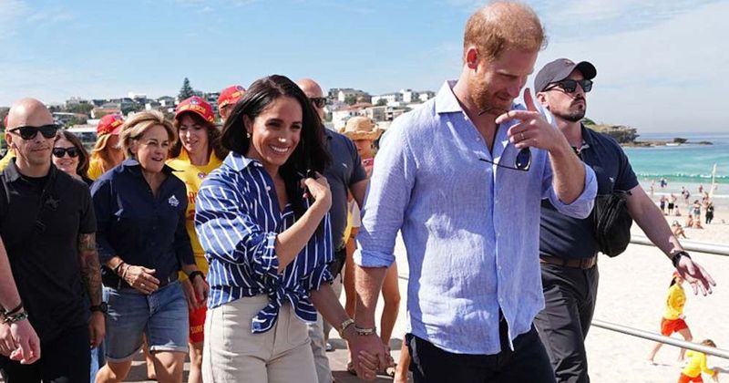 Prince Harry's Reaction to a Beachgoer Sleeping in His Path Has Fans Saying the Same Thing [Video]