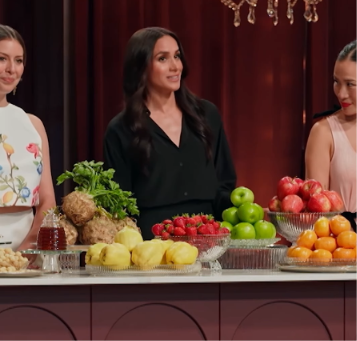 Meghan Markle shows the ingredients the contestants would be cooking with during her guest appearance on MasterChef Australia