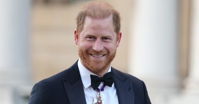 Prince Harry All Smiles for First UK Appearance Since Return to ‘British Soil’
