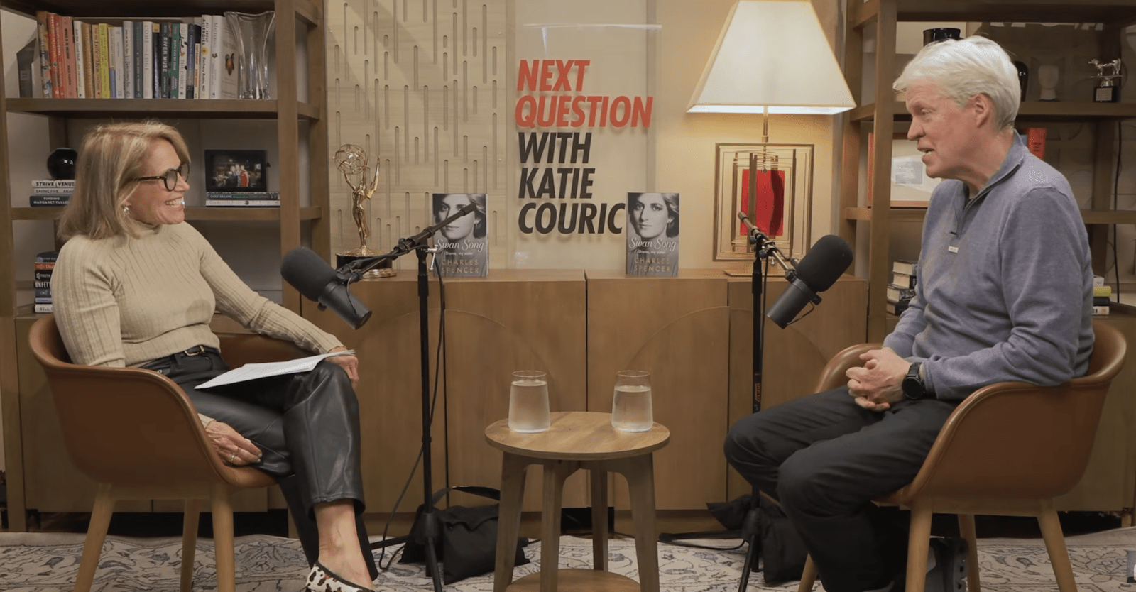 Katie Couric and Charles Spencer during the podcast. (Cover Image Source: YouTube | Katie Couric)